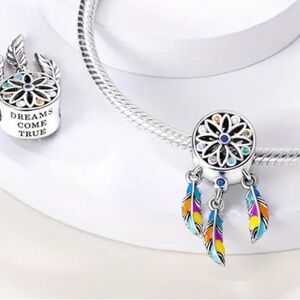 2️⃣ for $25 
925 Sterling Silver “Dreams come true” Dreamcatcher Charm.